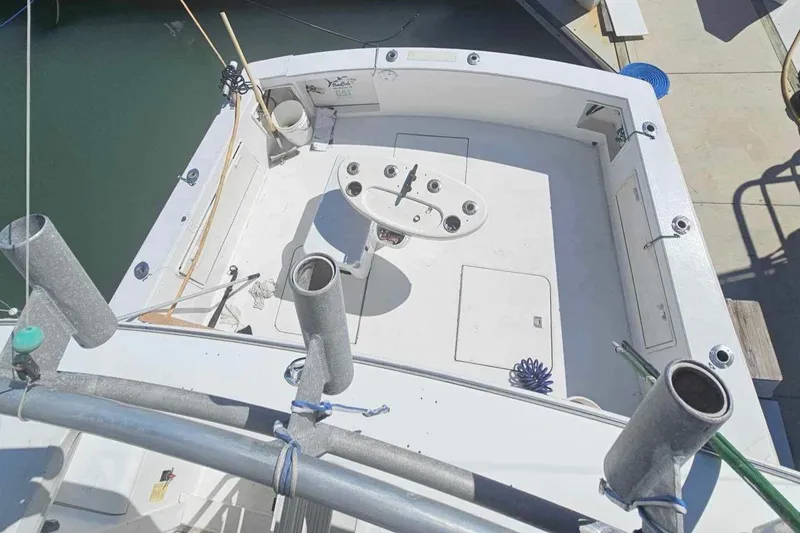 Slide: The Image of 1998 Ocean Yachts 40 Super Sport fishing deck with rod holders and tackle station. - 16