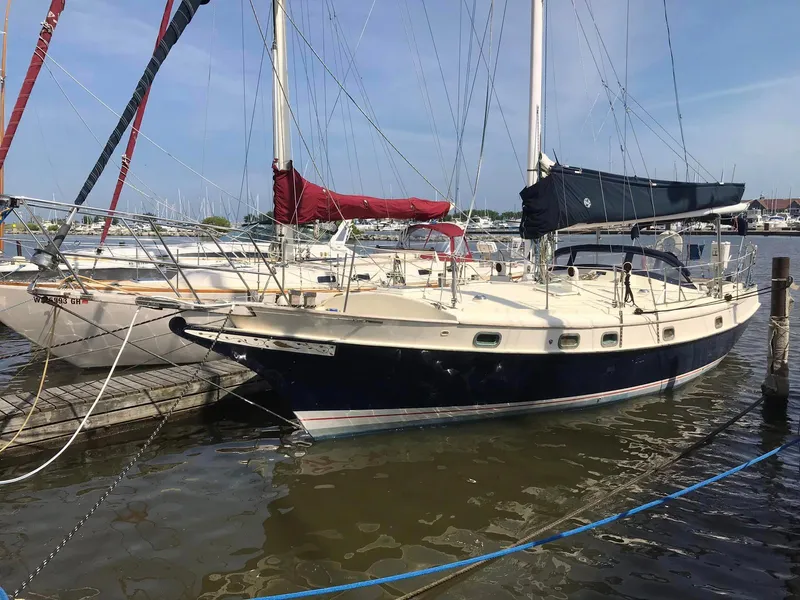 The Image of 1986 Krogen 38 sailboat docked at a marina. - 0