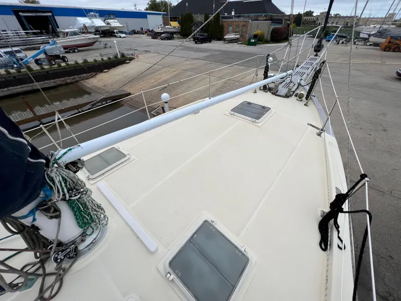 Slide: The Image of 1986 Krogen 38 sailboat deck view at a marina. - 16