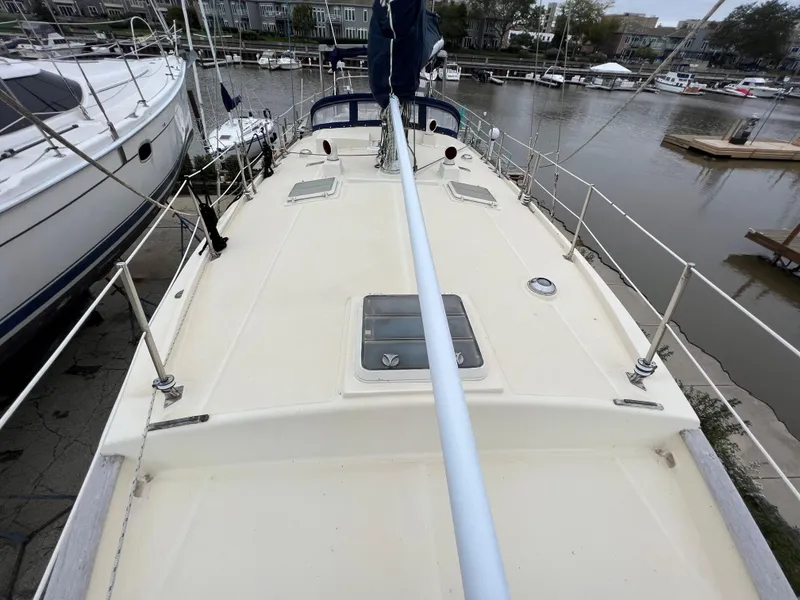 Slide: The Image of 1986 Krogen 38 sailboat deck view at marina. - 18