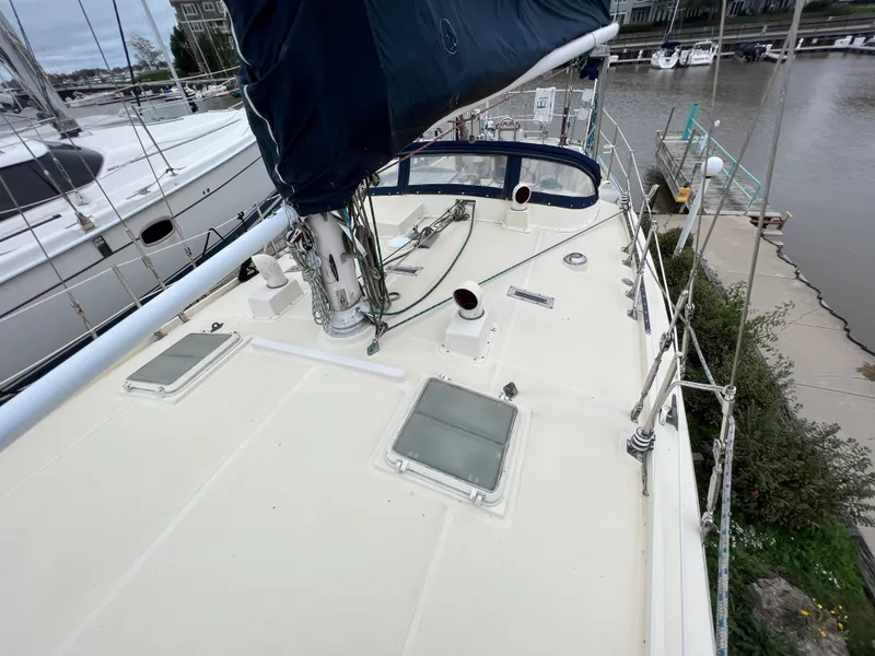 Slide: The Image of 1986 Krogen 38 sailboat deck view at marina. - 19