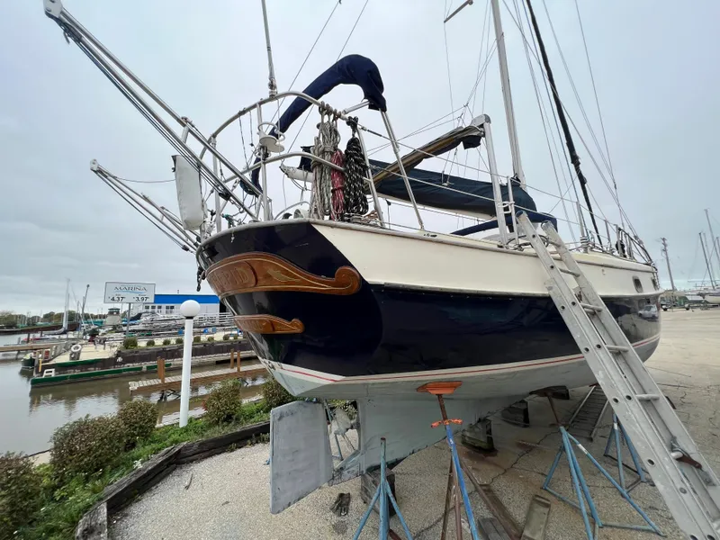 Slide: The Image of 1986 Krogen 38 sailboat on dry dock for maintenance. - 5