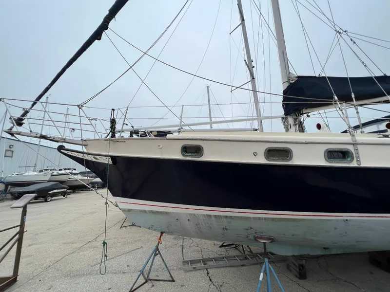 Slide: The Image of 1986 Krogen 38 sailboat on dry dock for maintenance. - 9