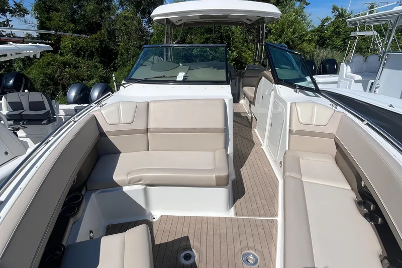 Slide: The Image of 2014 Formula 350 Crossover Bowrider with spacious seating and sleek design. - 4