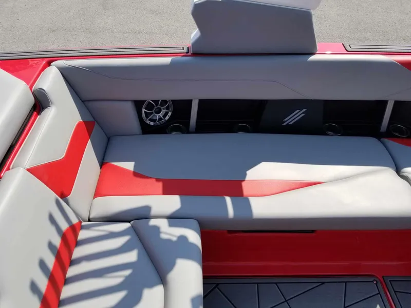 Slide: The Image of 2024 ATX Surf Boats 22 Type-S interior with red and gray seating. - 12