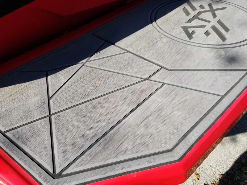 Slide: The Image of 2024 ATX Surf Boats 22 Type-S deck with geometric design and logo. - 15