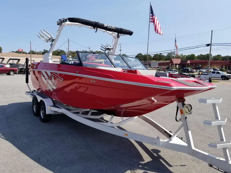 Slide: The Image of 2024 ATX Surf Boats 22 Type-S in vibrant red on a trailer. - 3