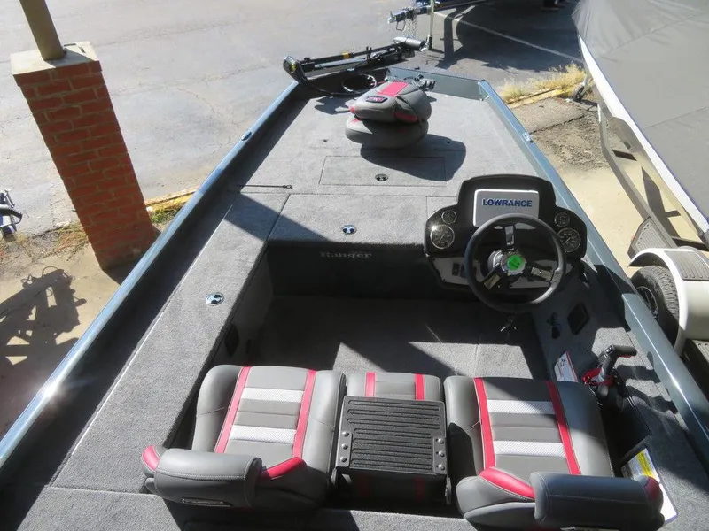 Slide: The Image of 2023 Ranger RT178C fishing boat interior with Lowrance electronics and dual seats. - 3