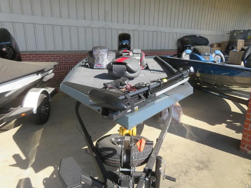 Slide: The Image of 2023 Ranger RT178C fishing boat on trailer in showroom. - 6