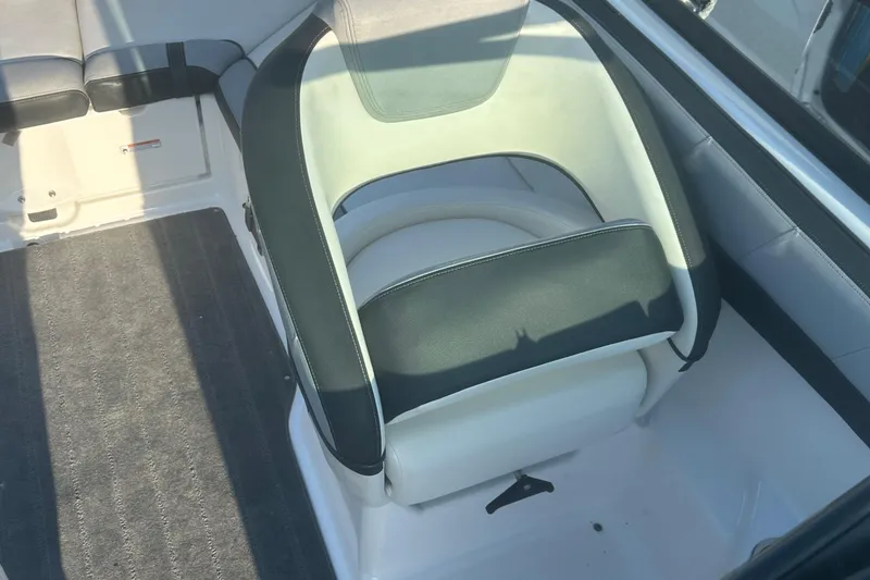 Slide: The Image of 2013 Yamaha Boats 212SS interior seating with black and white upholstery. - 25