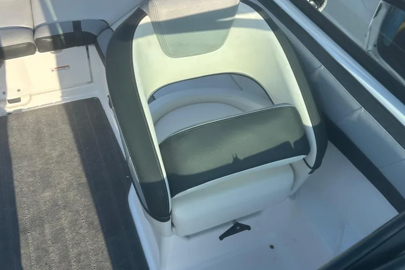 Slide: The Image of 2013 Yamaha Boats 212SS interior seat with black and white upholstery. - 29