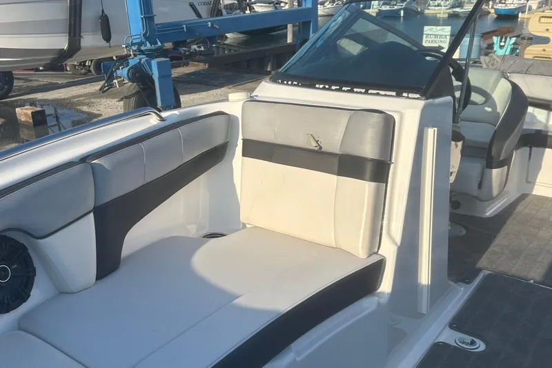 Slide: The Image of 2013 Yamaha Boats 212SS interior seating with black and white upholstery. - 33