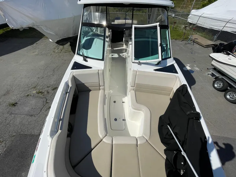 Slide: The Image of 2016 Boston Whaler 320 Vantage boat with spacious seating and open deck. - 18