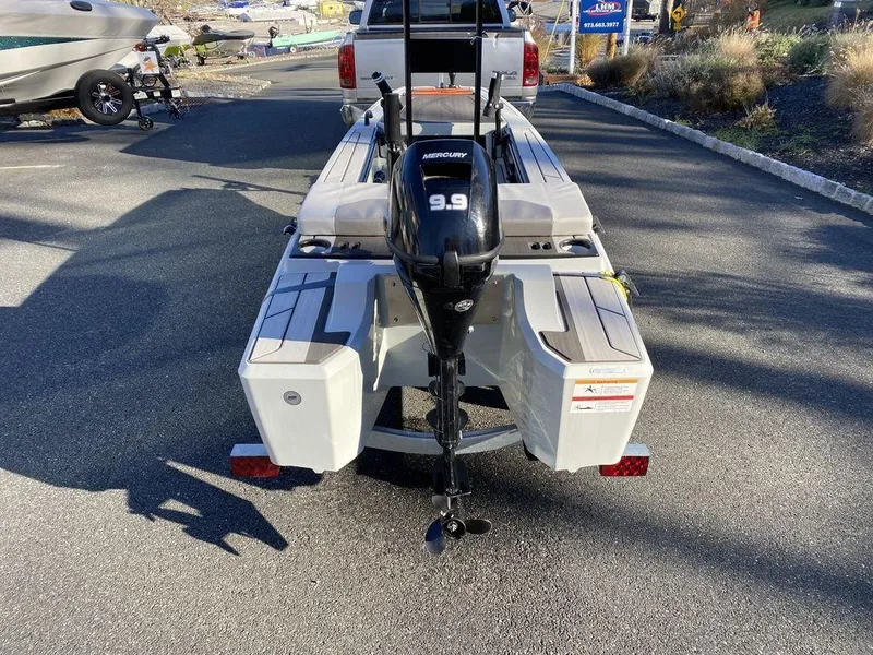 Slide: The Image of 2024 Veer V13 boat with Mercury 9.9 motor on a trailer. - 4
