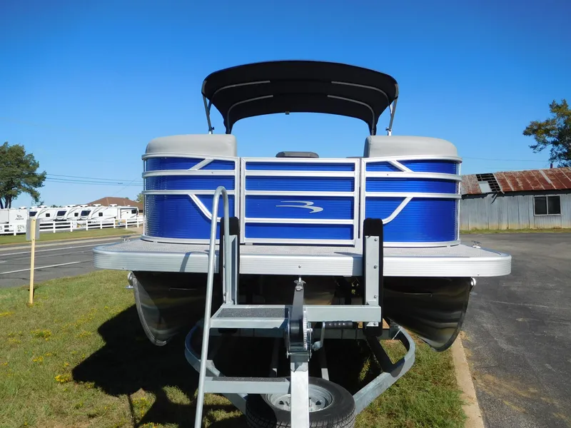 Slide: The Image of 2024 Bennington 22 SVSR pontoon boat on trailer, front view. - 8