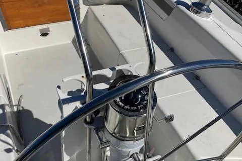 Slide: The Image of Steering wheel and compass on 2002 Catalina 34MK II sailboat deck. - 18