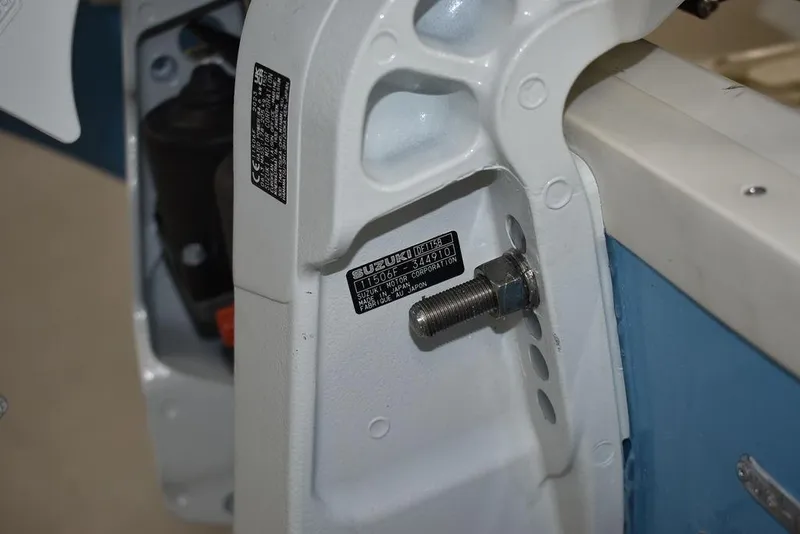 Slide: The Image of Close-up of 2024 Stingray 191DC boat engine mount bolt and identification plate. - 31