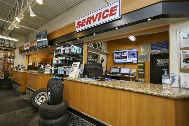 Slide: The Image of Yamaha Boats AR210 2018 service center with parts and maintenance area. - 26