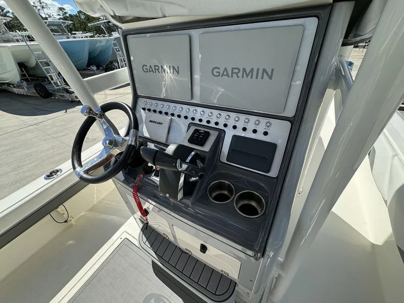 Slide: The Image of 2023 ShearWater 270 Carolina Open boat console with Garmin navigation system. - 12