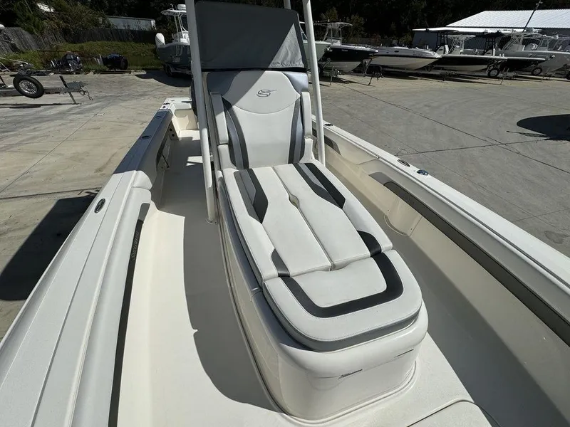 Slide: The Image of 2023 ShearWater 270 Carolina Open boat with cushioned seating. - 15