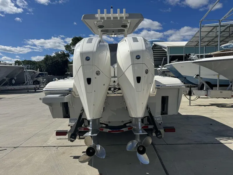 Slide: The Image of 2023 ShearWater 270 Carolina Open with twin outboard engines. - 8