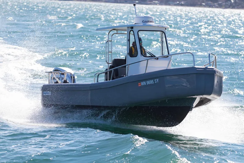 Slide: The Image of 2022 Bullfrog 22' Offshore Ranger boat cruising on the water. - 3