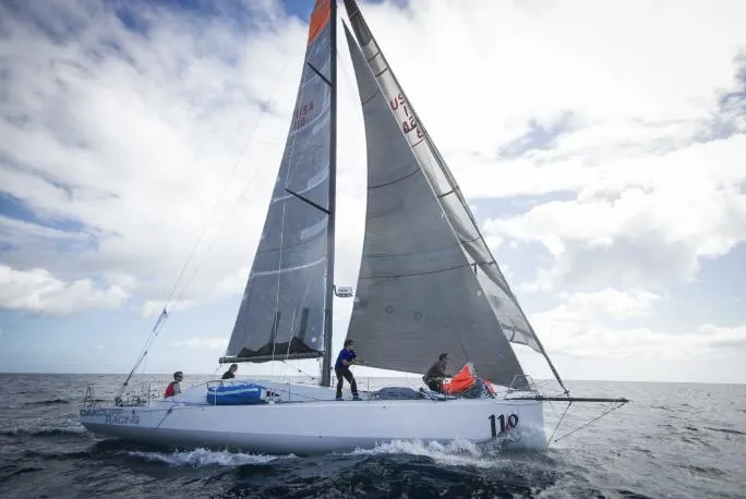 The Image of Sailing yacht Farr Class 40, 2011 model, navigating open sea under cloudy skies. - 0