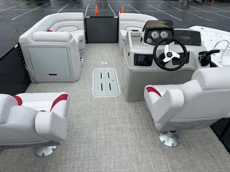 Slide: The Image of 2024 SunCatcher Select 322RC boat interior with seating and steering console. - 14