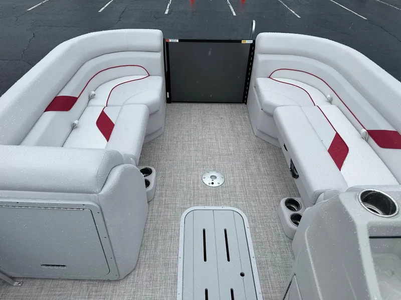Slide: The Image of 2024 SunCatcher Select 322RC pontoon boat interior with white and red seating. - 17