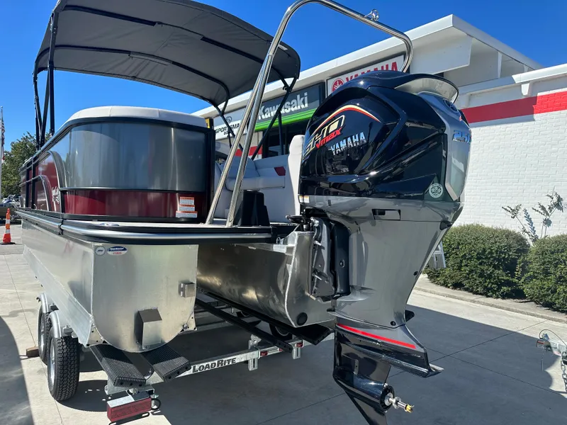 Slide: The Image of 2024 SunCatcher Select 322RC pontoon boat with Yamaha outboard motor. - 23