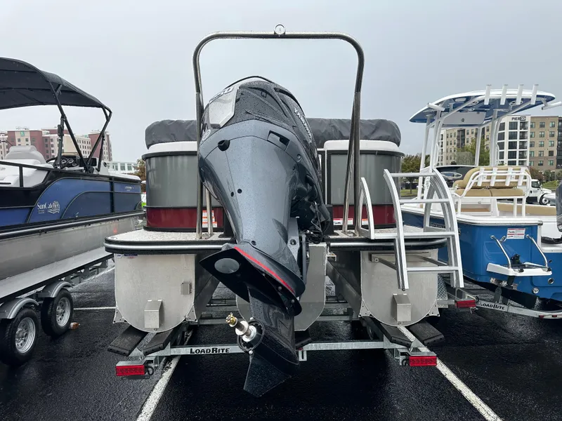 Slide: The Image of 2024 SunCatcher Select 322RC pontoon boat with outboard motor on trailer. - 5