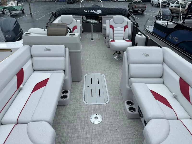 Slide: The Image of 2024 SunCatcher Select 322RC pontoon boat interior with plush seating and modern design. - 8