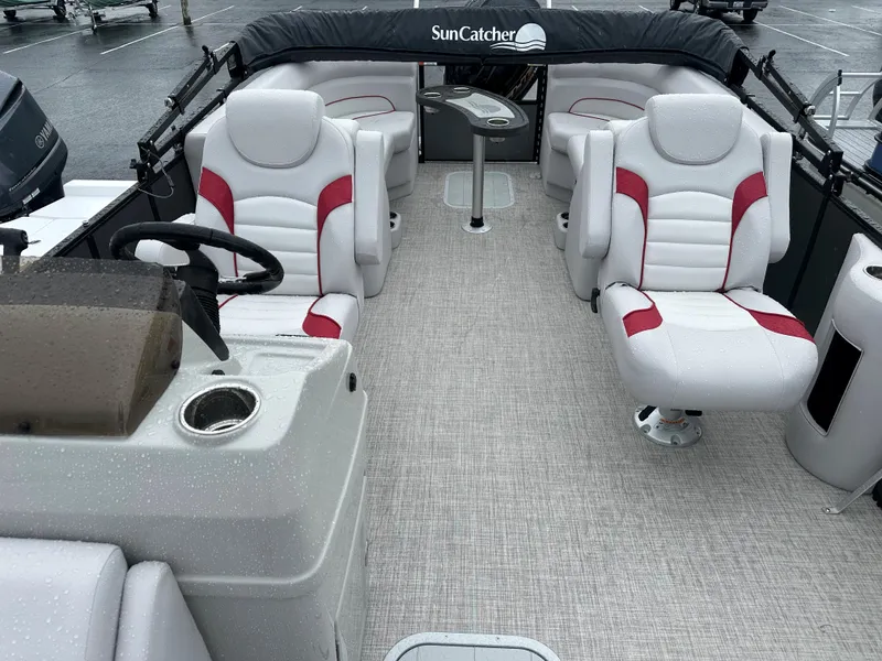 Slide: The Image of 2024 SunCatcher Select 322RC boat interior with white and red seating. - 9