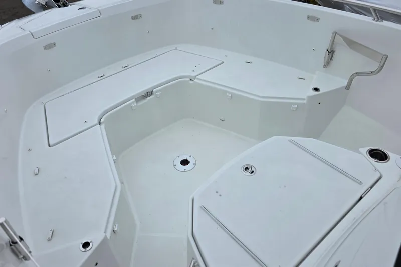 Slide: The Image of 2024 Jeanneau Leader 7.5 CC Series 3 boat interior, featuring spacious seating and storage. - 34