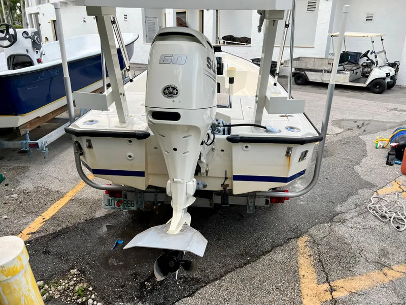 Slide: The Image of 1986 Hoog Comet 14 boat with Suzuki 60 HP outboard motor. - 7