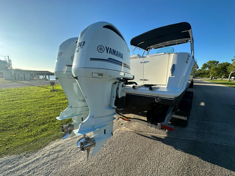 Slide: The Image of 2012 Contender 32 LS boat with twin Yamaha outboard engines. - 4