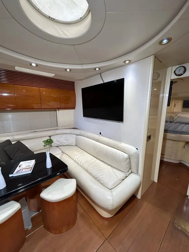 Slide: The Image of Luxurious interior of a 1999 Pershing 54 yacht with modern amenities. - 25
