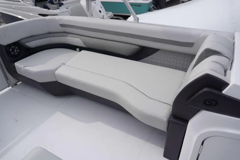 Slide: The Image of 2024 Hurricane FD 2360 RE3 boat with luxurious white seating. - 11