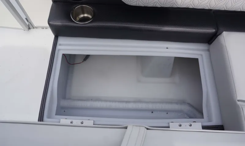 Slide: The Image of Storage compartment of 2024 Hurricane FD 2360 RE3 boat with cup holder. - 5