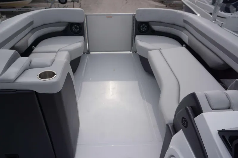 Slide: The Image of Interior of 2024 Hurricane FD 2360 RE3 boat with spacious seating and cup holder. - 9