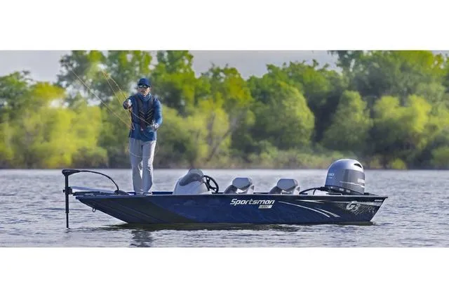 Slide: The Image of 2023 G3 1710 PFX boat with angler fishing on a serene lake. - 1