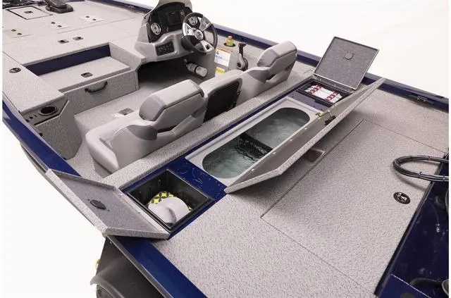 Slide: The Image of 2023 G3 1710 PFX boat interior with storage compartments and seating. - 5