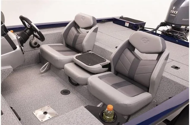 Slide: The Image of Interior of 2023 G3 1710 PFX boat with two cushioned seats and steering console. - 6
