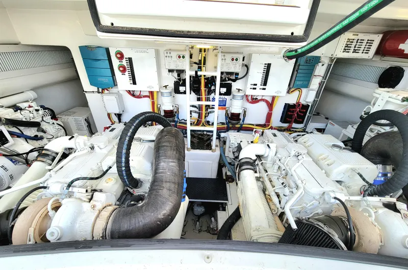 Slide: The Image of Engine room of 2016 Viking 42 Sport Tower with dual engines and control systems. - 31