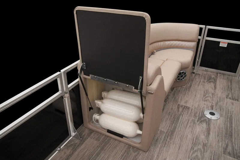 Slide: The Image of 2024 Ranger Reata 220C boat storage compartment with fenders. - 19