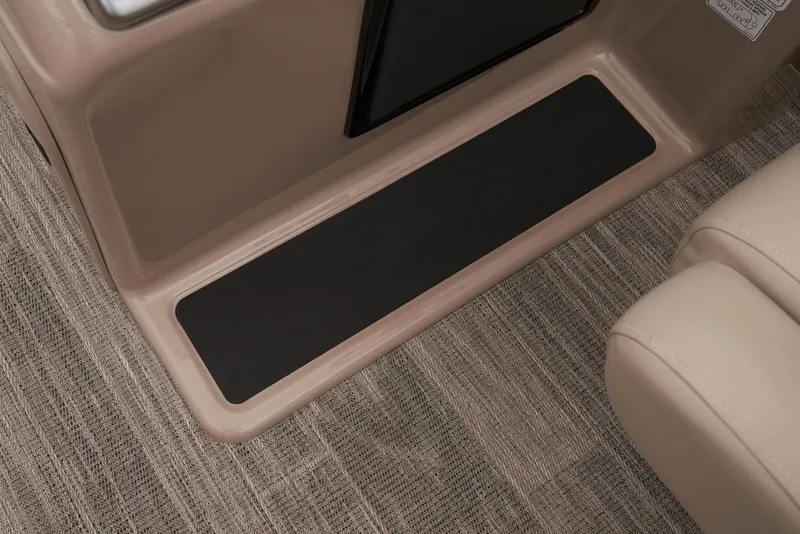 Slide: The Image of 2024 Ranger Reata 220C interior step detail with beige and black accents. - 24