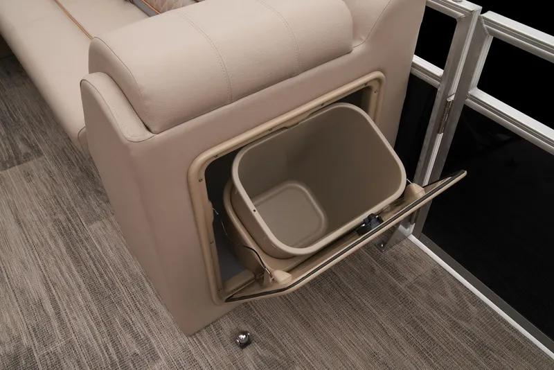 Slide: The Image of 2024 Ranger Reata 220C boat interior with built-in storage compartment. - 37