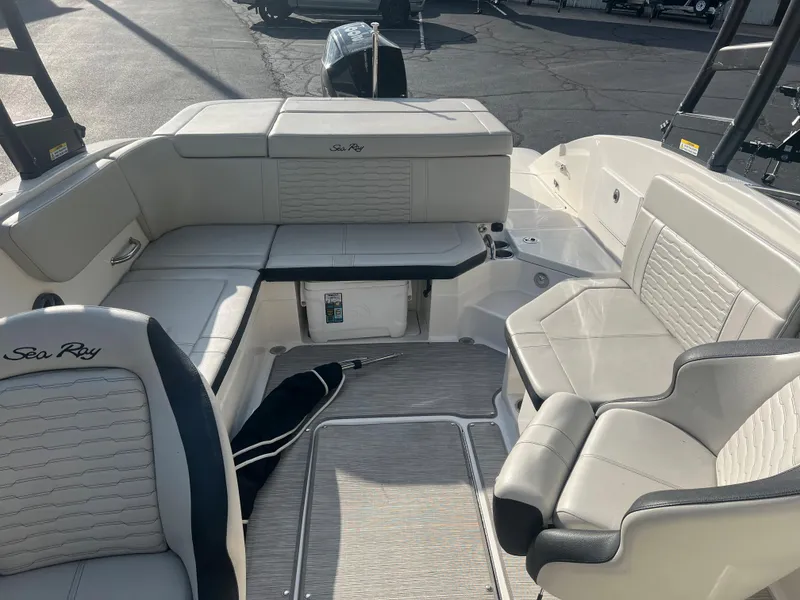 Slide: The Image of 2021 Sea Ray SPO 230 boat interior with luxurious seating and modern design. - 6
