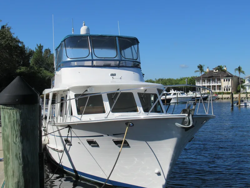 Slide: The Image of 2010 DeFever 48 Offshore yacht docked at a marina. - 3