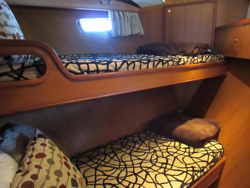 Slide: The Image of Bunk beds in the cabin of a 2010 DeFever 48 Offshore yacht. - 43